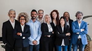 A photo of a group of varied age businesspeople