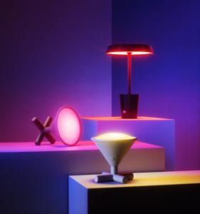 Modern LED Smart Lamps by Umbra, featuring Nanoleaf technology, on vibrant display.