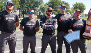 Photo of the four-person champion team, "Gas Masters".