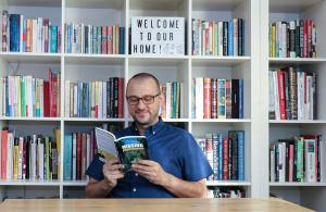 Tomas Kohoutek, author of Living With Teddy, in his Brooklyn apartment.