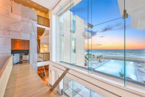 Glass Wall - 489 Ocean Shore Blvd Ormond Beach, Florida Oceanfront Homes For Sale.jpg