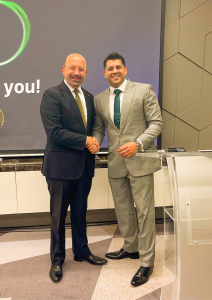 Ranjit Bahia, CEO of Cyferd, shaking hands with Tareq Wafa, CEO of Tricom Group, after a presentation in Bahrain