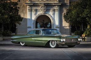 A long, green, custom Buick