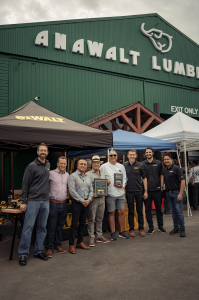 Anawalt accepts a recognition plaque from DeWalt