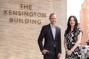 A photo of AshbyCapital Property Director Tom Smithers with Ashdown Phillips’ director & surveyor Holli Renton, at the Kensington Building.