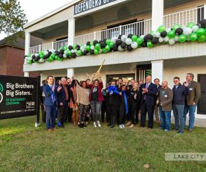 CEO Erin Davison and her team celebrate the reopening of the Big Brothers Big Sisters of SWLA headquarters following four natural disasters.