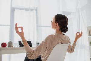 Women meditating for mental wellbeing