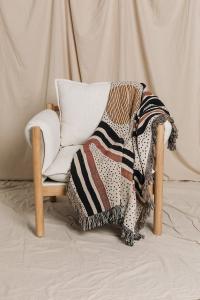 Parker's Redstripe design is featured on one of his best selling jacquard woven throw blankets.