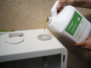 Bottle of Moogo Green Pro Concentrate, an eco-friendly mosquito control solution