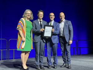 Eric Chu receives the WFC research award