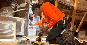 Atlanta heating maintenance performed by Estes Services technician