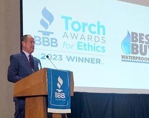 Andrew A. Altman Sr. accepts Torch Award