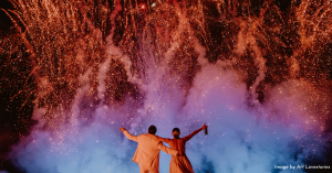 Wedding portrait of couple celebrating watching fireworks