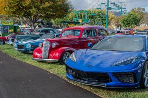 New Corvette parked with vintage cars