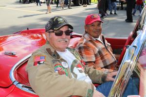 A veteran riding in a Corvette