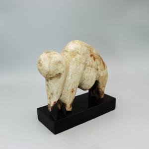 A palaeolithic sculpture of a mammoth made from mammoth ivory