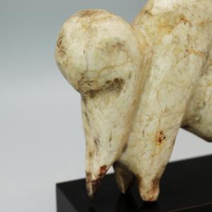 A palaeolithic sculpture of a mammoth made from mammoth ivory