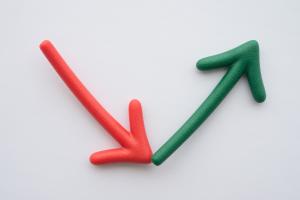 Arrow red fall and green rise up rebound, success concept