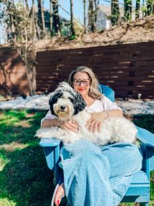 author photo with her dog Bentley