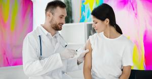 A doctor administering a new buprenorphine treatment via subcutaneous injection to a patient's arm.
