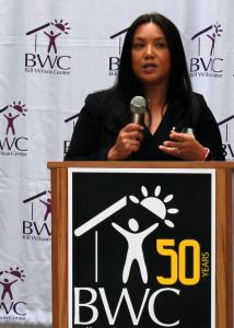 Rowena Tomaneng speaking at podium