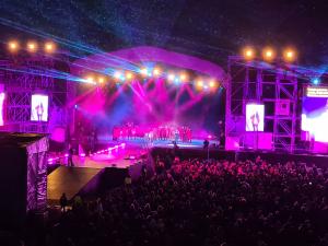 January 2023 Concert at Headingley Stadium, Leeds, pink lights, crowd, stage