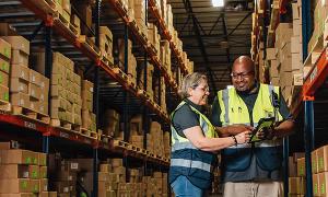 Two NXTPoint employees in warehouse