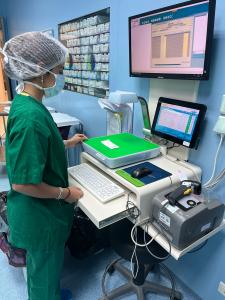 Nurse using Snap&Go computer sensor to document surgical supply utilization