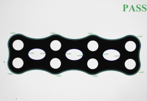 An orthopedic plate passes inspection with all edges within tolerance.