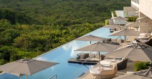 ATELIER-Playa-Mujeres-Building-2-Rooftop-Pool-El-Cielo-Day-02