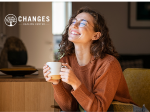 A woman enjoys a morning coffee sober after having completed inpatient rehab in Arizona at Changes Healing Center