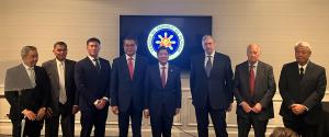 Photo showing representatives from Meralco and USNC with Philippine President Ferdinand Marcos.