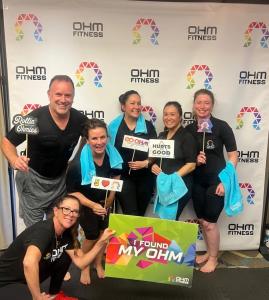 Danielle Conklin and her OHM Fitness Class after a workout