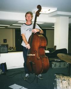 Photo of Linzi O with Double Bass at rehearsal