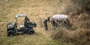 Hunter setting up blind with his electric untamed UTV.