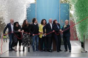 Executives of Scientology and friends pulling the ribbon of the new Ideal Mission