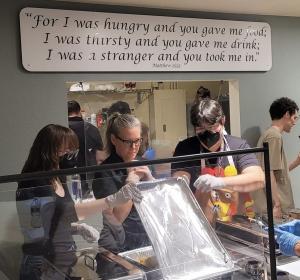 Katie Hobbs serving a Thanksgiving meal at the Justa center in Phoenix
