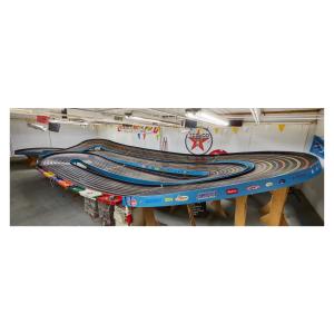 Monumental, 8-lane, 1:24 scale Arcade slot car track, laminated wood, made in Toronto, 1970s, a custom-built, 684 square foot (38 inch by 18 inch) masterpiece (est. CA$9,000-$12,000).