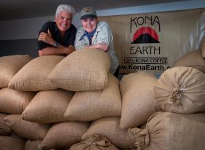 Kona Earth owners Steve and Joanie Wynn with their bags of Kona coffee