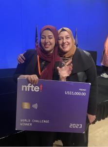 Raneem Al Suwaidani holds her trophy as the winner of the NFTE World Youth Entrepreneurship Challenge