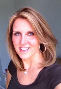 Portrait photo of Teresa Koska with a blue background