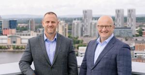 Jeff Lee and Chris Cowell mark the successful completion of CSG's management buyout