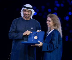 Angela Homsi, Ignite Power's President, receives the prize by His Highness Sheikh Mohamed bin Zayed Al Nahyan, President of the UAE