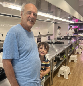 Shep Gordon and his son at Little Kitchen Academy