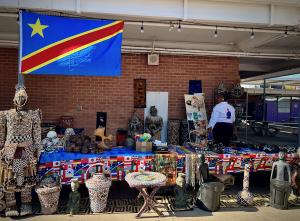 Kwete African Art exhibit featuring masks, baskets, clothing and furniture.
