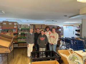 Talawanda, OH team members with Kiwanas Food Pantry staff