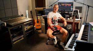 Jeff Bone creating music in his recording studio.