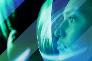 Stylised image of a woman in greens and blues