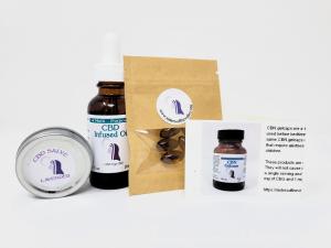 A two-ounce amber bottle of cbd oil, an amber jar of topical salve, also 2 oz, and a ten-pack of CBN sleeping capsules