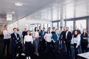 The team of HYDROGRID poses from their offices in Vienna, Austria